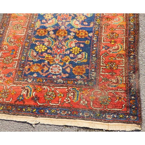 897 - A blue ground runner with red border approx 400cm long x 103cm wide, (a/f)
Sold on behalf of the Ter... 