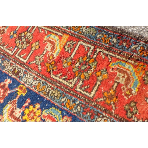 897 - A blue ground runner with red border approx 400cm long x 103cm wide, (a/f)
Sold on behalf of the Ter... 