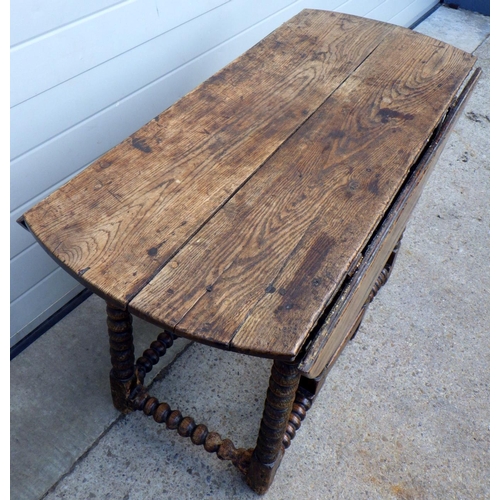 905 - A rustic oak gateleg table, 109cm across
Sold on behalf of the Terry family York (Terry's Chocolates... 