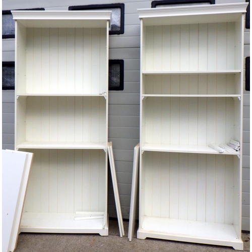 909 - A pair of tall modern white painted open bookcases 91cm wide x 215cm tall
Sold on behalf of the Terr... 