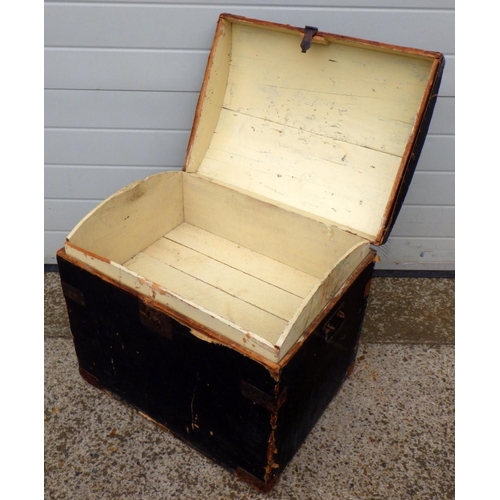 911 - A canvas covered dome topped trunk, 61cm wide