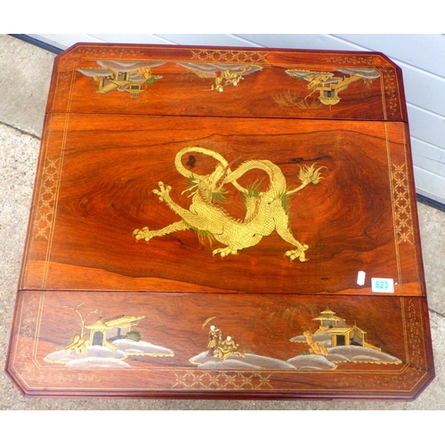 823 - An Edwardian rosewood drop leaf occasional table with chinoiserie decoration, 72cm long