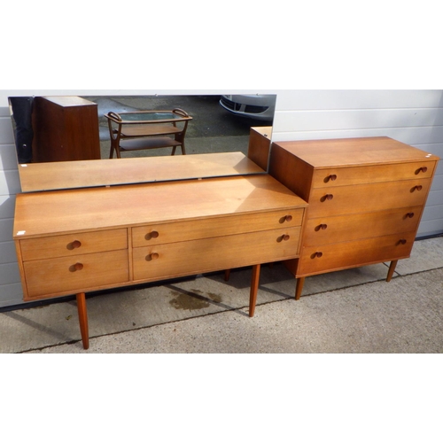 809 - An Avalon teak dressing table, 132cm wide together with a matching chest of drawers (2)