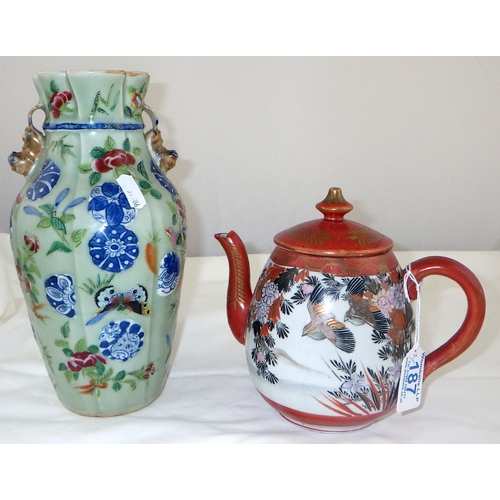 187 - An Oriental vase decorated with flowers and butterflies 24 cm tall together with a tea pot (2)