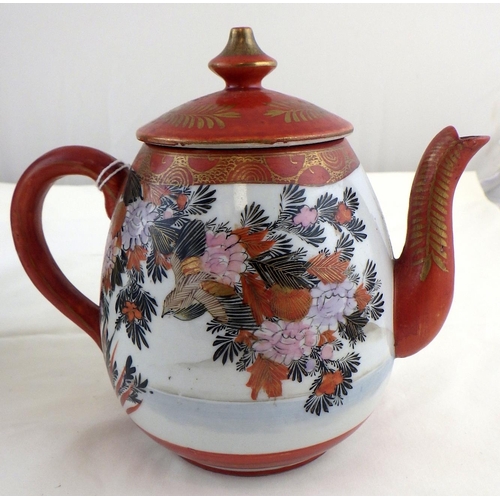 187 - An Oriental vase decorated with flowers and butterflies 24 cm tall together with a tea pot (2)