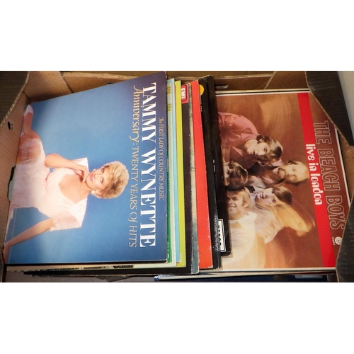 212 - Four boxes of mainly pop Lps (4)