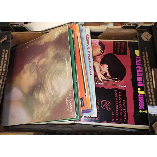 212 - Four boxes of mainly pop Lps (4)