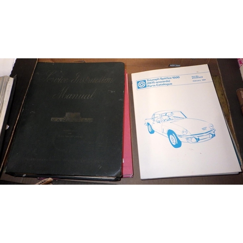 216 - A group of vintage car manuals