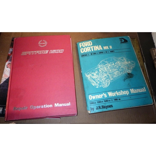 216 - A group of vintage car manuals