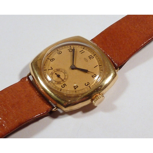 32 - An IWC wristwatch comprising an International Watch Company signed movement behind a gilt dial in an... 