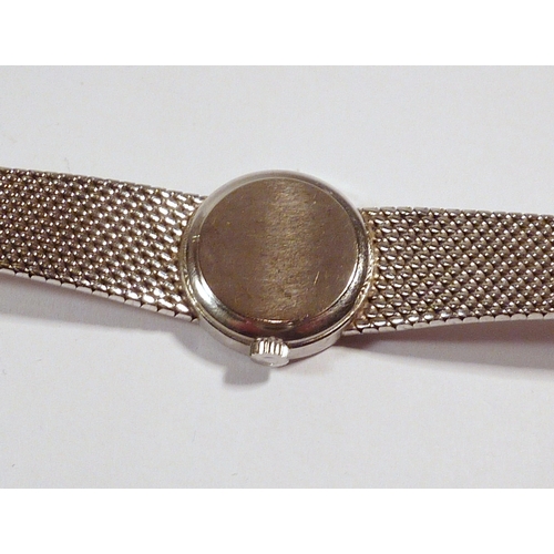38 - An Omega Geneve ladies bracelet watch having a manual wind movement in a 9ct white gold textured cas... 