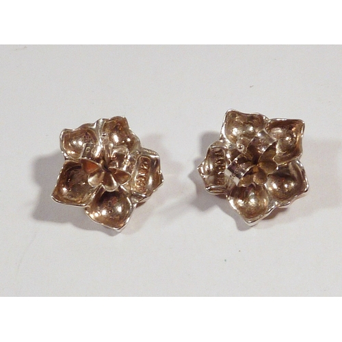 50 - A pair of Tiffany & Co stud earrings modelled as flower heads, white metal marked 925 set with pearl... 