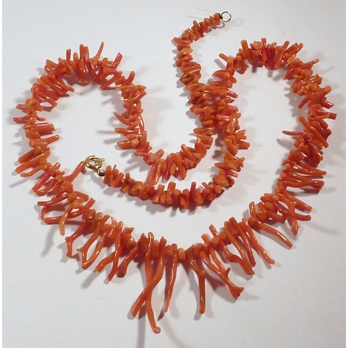 63 - A red coral necklace, 520mm long.