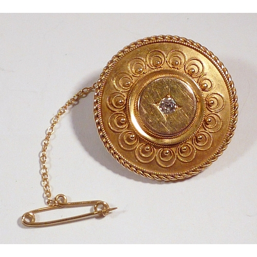 69 - A mourning brooch, early 20th cent, yellow metal marked 15ct set with a central old cut diamond.  Br... 