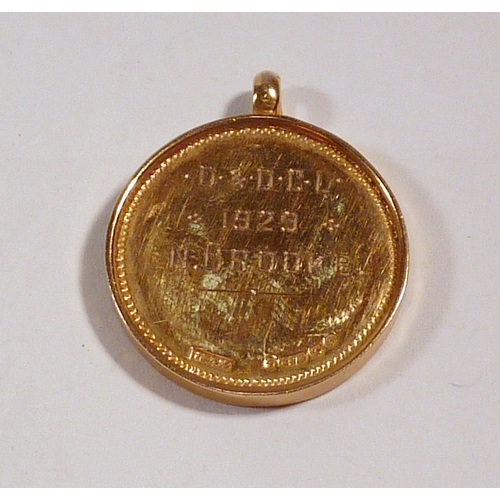 71 - A 9ct gold and enamel presentation fob. 6g gross / 23mm diameter.