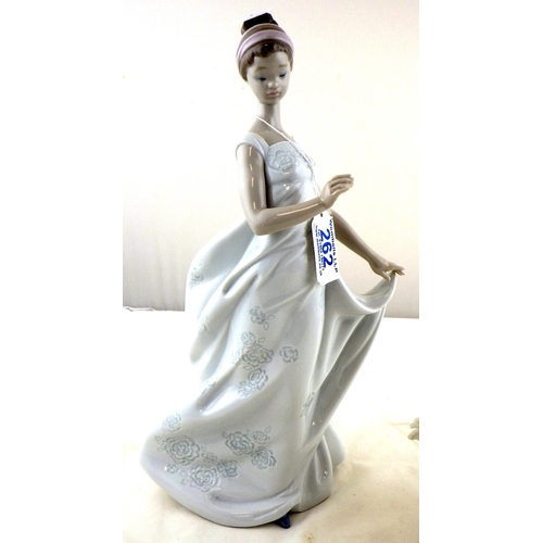 262 - A Lladro figure of a girl with an umbrella 33cm tall