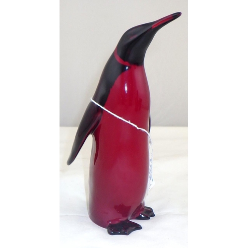 267 - A group of Royal Doulton Flambe to inc a penguin 15cm tall (4)