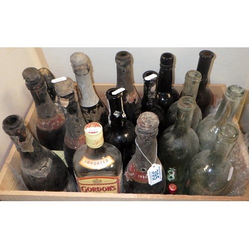 395 - A group of misc empty bottle in a wine crate