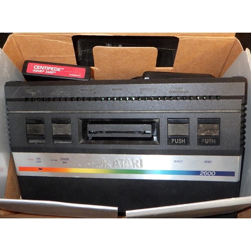 545 - An Atari 2600 and two games ALL ELECTRICALS SOLD AS SEEN.