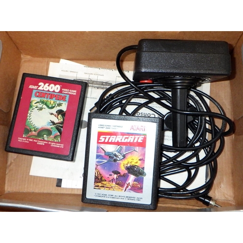 545 - An Atari 2600 and two games ALL ELECTRICALS SOLD AS SEEN.