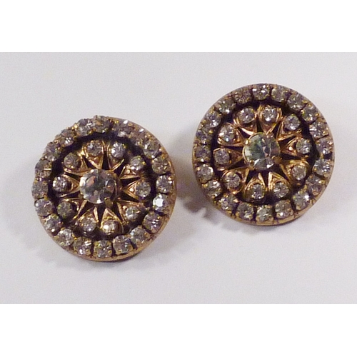 103 - A pair of Chanel clip-on earrings, comprising a cluster of paste stones set in signed gilt base meta... 