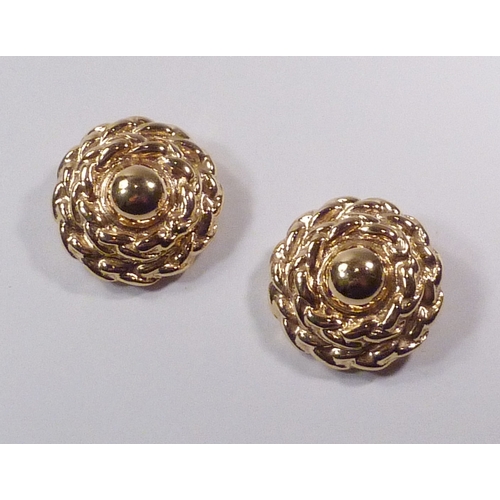 107 - A pair of Yves Saint Laurent clip-on earrings being gilt base metal twist wreaths marked YSL / Made ... 