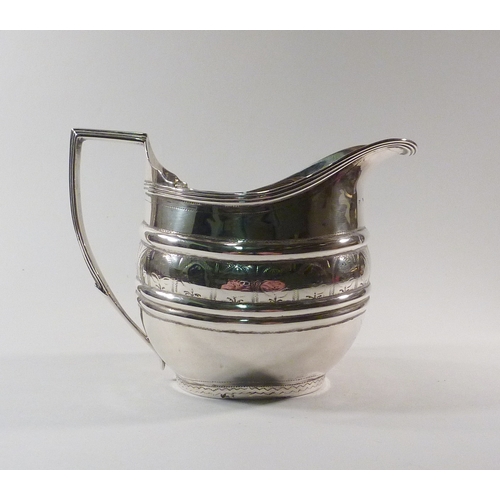 3 - A George III silver jug, Newcastle assay, mark rubbed.  104g / 82mm tall.