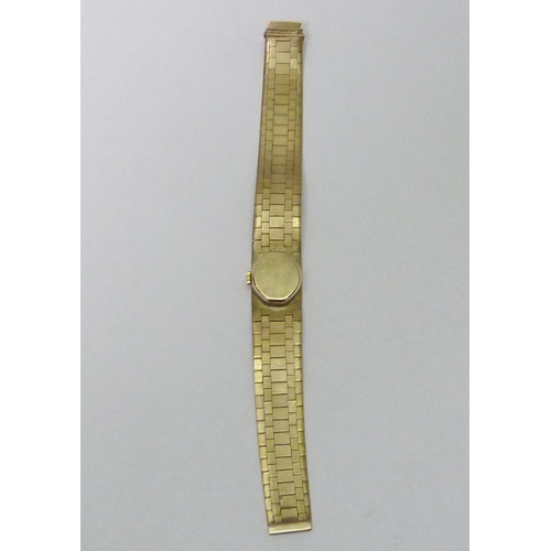 45 - A Berkley ladies 9ct gold bracelet watch having a manual wind movement.  16mm across head / 165mm lo... 