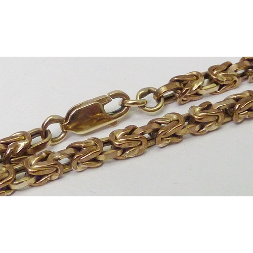 79 - A fancy link bracelet, 9ct gold.  208mm long / 8g
