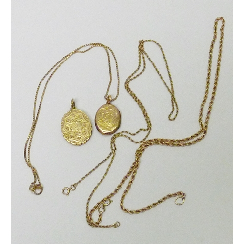 97 - A 9ct gold front and back locket suspended on a 9ct gold chain; another photo locket, a/f interior l... 