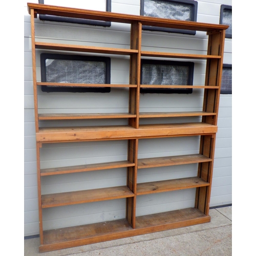 791 - A two section open bookcase, 183cm wide