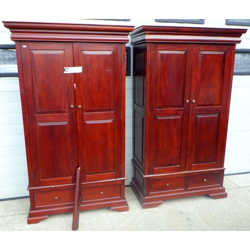 793 - A pair of Indonesian hardwood wardrobes, 112cm wide