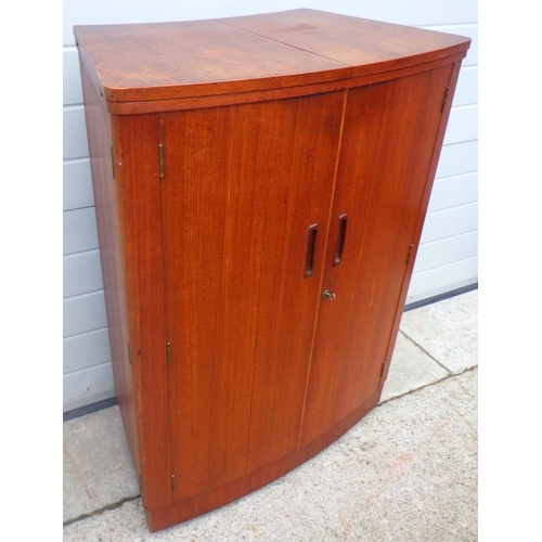 813 - A 1960's fold out teak bar, 83cm wide