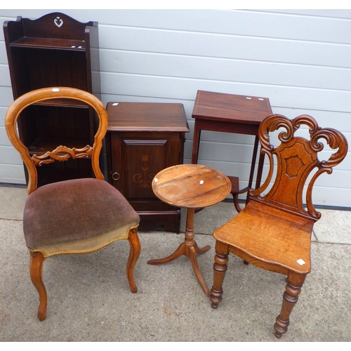 817 - A narrow oak open bookcase, Victorian oak hall chair, balloon back salon chair, bedside cupboard, tw... 