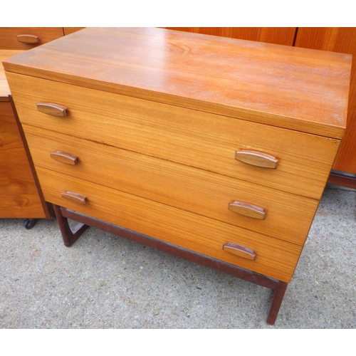 821 - A G.Plan, E.G teak dressing table, tallboy & chest, some fading, together with a teak blanket box (4... 