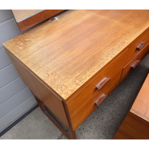 821 - A G.Plan, E.G teak dressing table, tallboy & chest, some fading, together with a teak blanket box (4... 