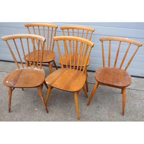 822 - A set of four Ercol kitchen chairs, together with another similar (5) some fading