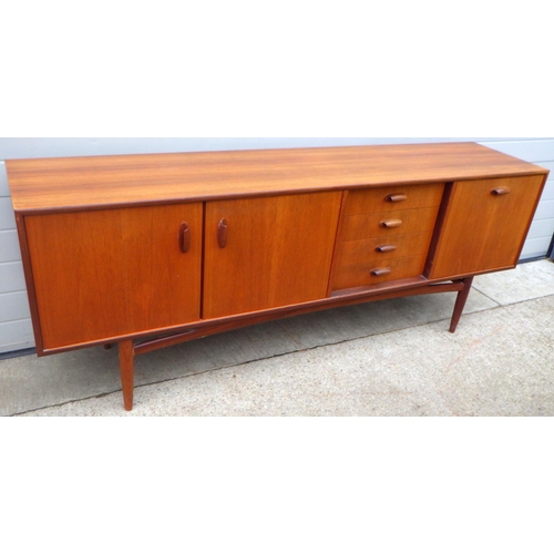 823 - A G.Plan teak dining suite, incl sideboard,  drop leaf table, 6 chairs, sideboard handle broken & re... 