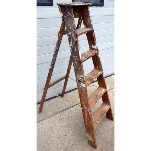 828 - A set of wooden step ladders