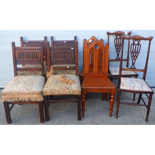 832 - A pair of Victorian oak hall chairs, pair of Edwardian bedroom chairs and a set of four oak dining c... 