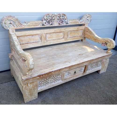 863 - A limed hardwood day bed, 189cm wide