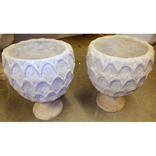 866 - A pair of pineapple shaped concrete garden urns, 40cm across