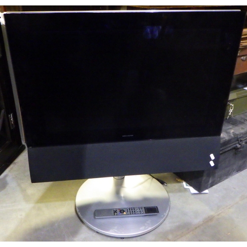 872 - A Bang & Olufsen television with remote, sold as seen