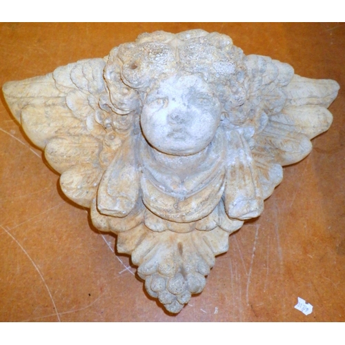 878 - A cherubs face concrete wall plaque