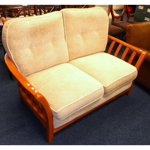 888 - A two seater settee with wooden frame