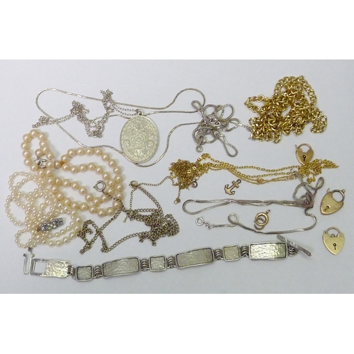 112 - A group of yellow metal and other neck chains, some a/f; three various locket clasps; silver and whi... 