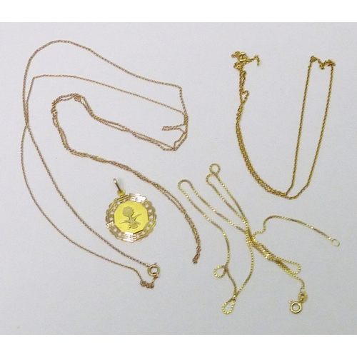 113 - An octagonal pendant having applied Saudi Arabian interest motif, yellow metal marked 750, 23mm acro... 