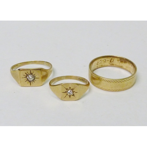 114 - Two diamond set yellow metal signet rings; a 9ct gold band ring, this last 3g.  (3)