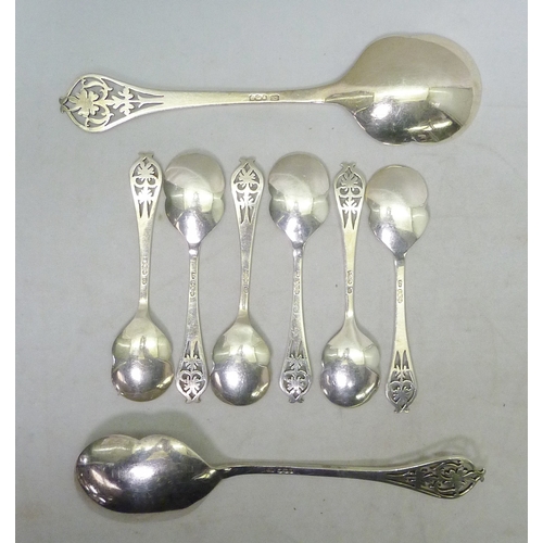 124 - A set of silver fruit salad spoons, comprising two serving spoons and six eating spoons.  Serving sp... 