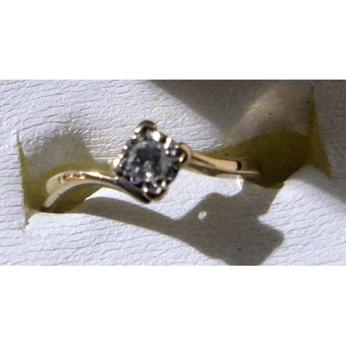 96 - A solitaire ring comprising a brilliant cut diamond in a square illusion setting, 9ct gold; a solita... 